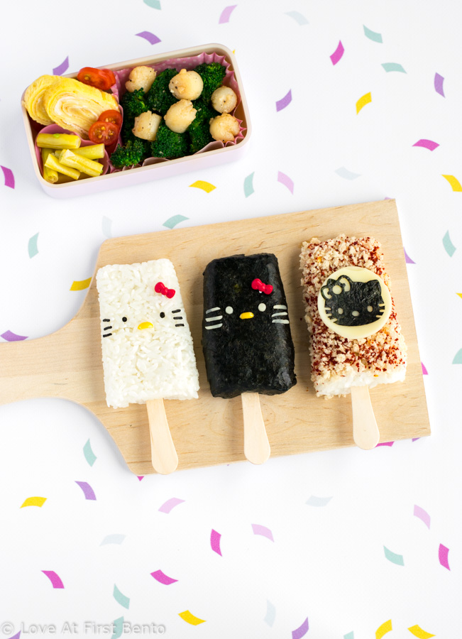 Hello Kitty Rice Popsicles - Easily shape your rice into popsicles by using a standard popsicle mold! Find out how at loveatfirstbento.com | bento box, character bento, cute food.