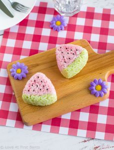 Watermelon Onigiri - Fun to make & delicious to eat, watermelon onigiri are the perfect summer bento box or picnic lunch item! Learn how to make these adorable summer rice balls by visiting www.loveatfirstbento.com (includes video tutorial!)