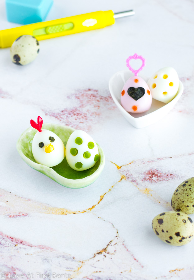 4 Ways to Decorate Eggs - Step-by-step tutorial (+ video!) for making colored eggs, dinosaur eggs, flower eggs, & chicken eggs. Makes the perfect addition to any bento box! Works on hard-boiled quail or chicken eggs. | www.loveatfirstbento.com/4-easy-ways-to-decorate-eggs/