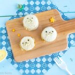 Mini Baby Seal Fish Burgers Bento Box - Learn how easy it is to make these adorable baby seals for lunch! Easy, delicious, and almost too cute to eat, they make the perfect addition to any nautical themed bento box. | loveatfirstbento.com