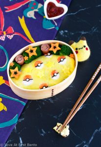 Pokeball Omelette Rice (Omurice) Bento Box - Become a Pokemon master by making this Pokemon themed character bento box for lunch, which includes step-by-step instructions + video tutorial. Perfect for Pokemon fans of all ages! | www.loveatfirstbento.com