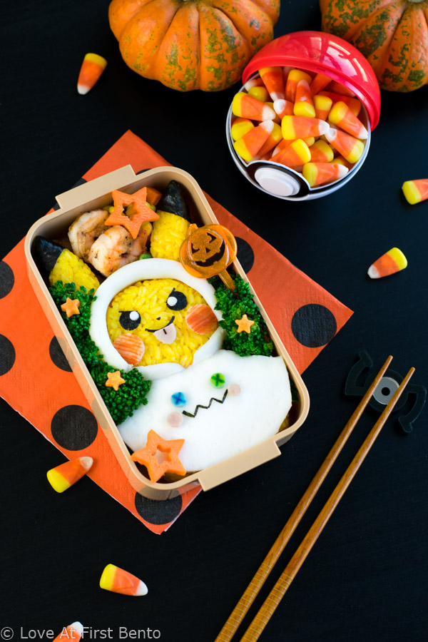 Halloween Pikachu Bento Box - Celebrate Halloween Pokemon style by making this adorable Halloween Pikachu character bento! Step-by-step instructions + video tutorial reveal how to get perfectly yellow rice & easily shape your rice into the perfect Pikachu. | loveatfirstbento.com {kyaraben, lunch, onigiri}