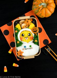 Halloween Pikachu Bento Box - Celebrate Halloween Pokemon style by making this adorable Halloween Pikachu character bento! Step-by-step instructions + video tutorial reveal how to get perfectly yellow rice & easily shape your rice into the perfect Pikachu. | loveatfirstbento.com {kyaraben, lunch, onigiri}
