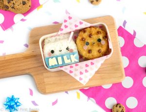 Milk & Cookies Bento Box - Made from rice and potato korokke, this milk & cookies bento box may just be the cutest lunch ever! Find out the secret kitchen hack used to easily shape the rice, + how to dye food blue NATURALLY in under 10 seconds | loveatfirstbento.com