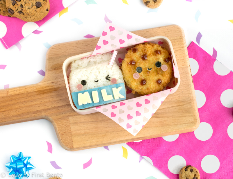 Milk & Cookies Bento Box - Made from rice and potato korokke, this milk & cookies bento box may just be the cutest lunch ever! Find out the secret kitchen hack used to easily shape the rice, + how to dye food blue NATURALLY in under 10 seconds | loveatfirstbento.com