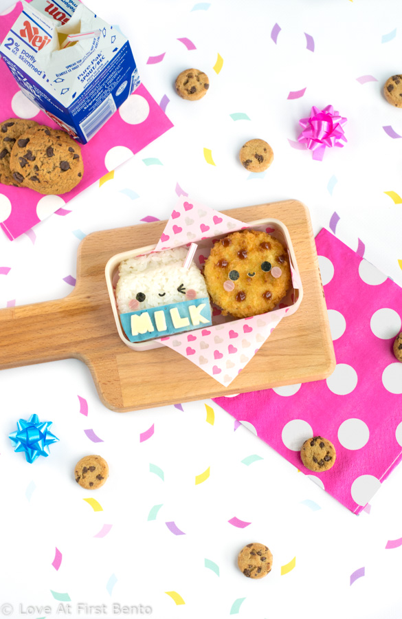 Milk & Cookies Bento Box - Made from rice and potato korokke, this milk & cookies bento box may just be the cutest lunch ever! Find out the secret kitchen hack used to easily shape the rice, + how to dye food blue NATURALLY in under 10 seconds | loveatfirstbento.com