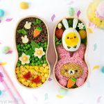 Bunny Rilakkuma Easter Bento - Learn how to turn Rilakkuma & Kiiroitori into adorable Easter bunnies, using naturally dyed rice, onigiri molds, and hard-boiled eggs. A guaranteed lunchtime hit for Rilakkuma fans of all ages! Get the recipe at: loveatfirstbento.com {character bento box, kyaraben, rabbit}