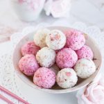 Salted Rose Onigiri - WOW your friends with the unique flavor of pickled rose petals, which take these rice balls to a whole new level of edible elegance! Plus, I reveal a super easy, 2-ingredient rose salt recipe perfect for sprinkling on top. These onigiri are absolutely perfect for a Mother's Day or spring bento box - a guaranteed crowd-pleaser! Get the recipe at loveatfirstbento.com