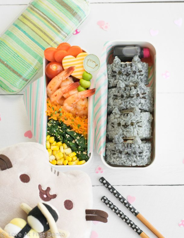 pusheen holding sushi