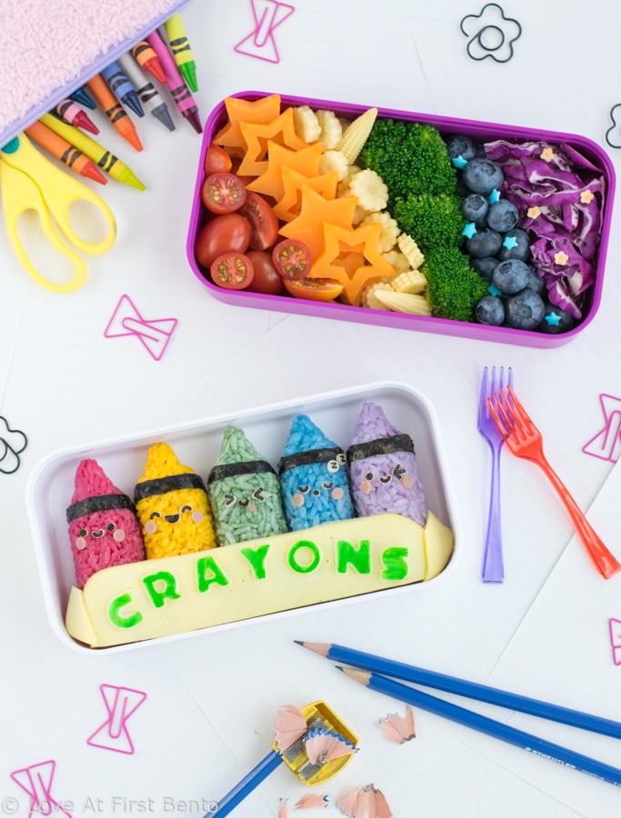 Colorful Crayon Bento Box - This super cute & colorful back-to-school bento is sure to score an A+ with students of all ages! Made from naturally dyed rice and shaped using a rice mold, even a bento beginner can easily recreate this vibrant school-themed lunch! Find out how at: loveatfirstbento.com