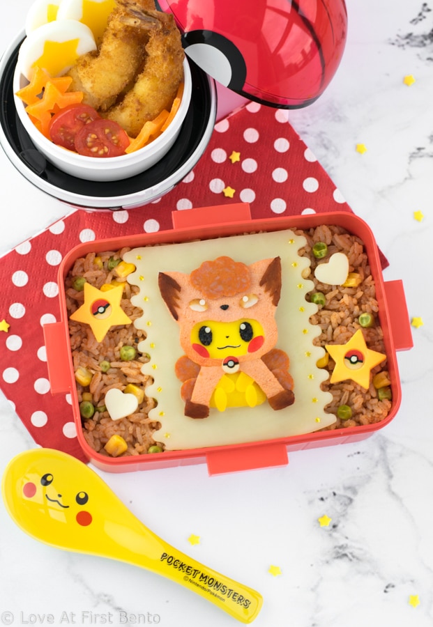 Vulpix Pikachu Bento Box - Pokemon fans will FLIP over this insanely adorable Pokemon bento, which features Pikachu dressed up as a Vulpix! 100% edible & perfect for decorating rice, this bento can easily be created by anyone thanks to my 'secret hack' for easily & accurately creating images out of food. Get the recipe at: loveatfirstbento.com [character bento, kyaraben, lunch]