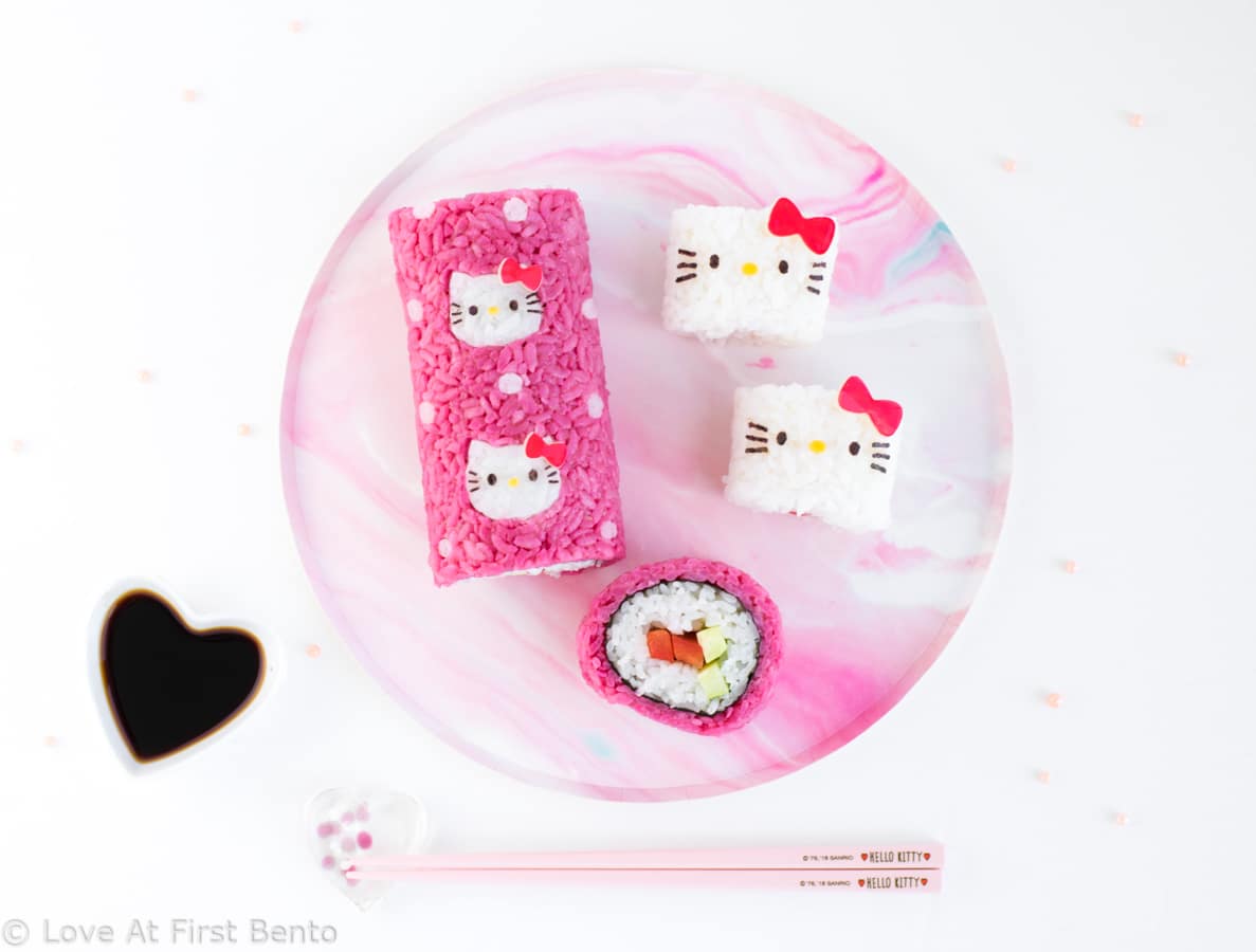 Hello Kitty Sushi Party - The perfect way to celebrate International Sushi Day! These 5 adorable Hello Kitty sushi designs are a Hello Kitty fan's dream come true, and a truly almost too cute to eat! Even complete beginners can learn how to make these Hello Kitty sushi from start to finish - find out how by visiting loveatfirstbento.com