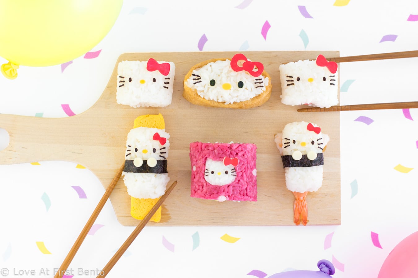 Hello Kitty Sushi Party - The perfect way to celebrate International Sushi Day! These 5 adorable Hello Kitty sushi designs are a Hello Kitty fan's dream come true, and a truly almost too cute to eat! Even complete beginners can learn how to make these Hello Kitty sushi from start to finish - find out how by visiting loveatfirstbento.com