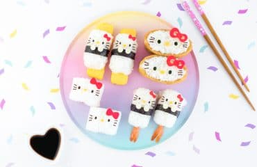 Hello Kitty Sushi Party - The perfect way to celebrate International Sushi Day! These 5 adorable Hello Kitty sushi designs are a Hello Kitty fan's dream come true, and a truly almost too cute to eat! Even complete beginners can learn how to make these Hello Kitty sushi from start to finish - find out how by visiting loveatfirstbento.com