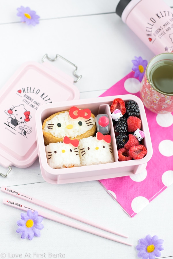 Hello Kitty Sushi Party Bento - The perfect way to celebrate International Sushi Day! These 5 adorable Hello Kitty sushi designs are a Hello Kitty fan's dream come true, and a truly almost too cute to eat! Even complete beginners can learn how to make these Hello Kitty sushi from start to finish - find out how by visiting loveatfirstbento.com