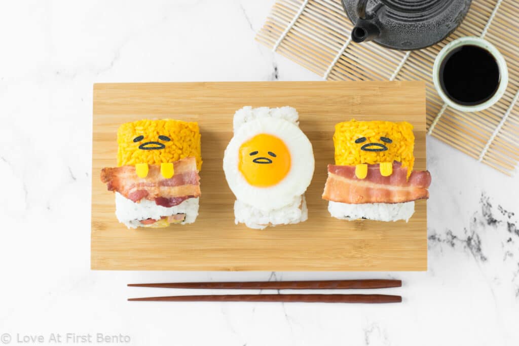 Gudetama Sushi - These bright yellow Gudetama sushi rolls will make Gudetama fans FLIP! Easy to make, and colored using all-natural ingredients, these make for the most perfect and tasty sushi ever! Get the recipe at: loveatfirstbento.com [sushi, egg, bento, lunch}