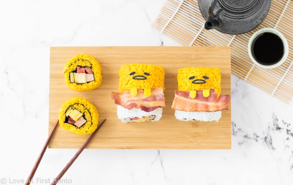 Gudetama Sushi - These bright yellow Gudetama sushi rolls will make Gudetama fans FLIP! Easy to make, and colored using all-natural ingredients, these make for the most perfect and tasty sushi ever! Get the recipe at: loveatfirstbento.com [sushi, egg, bento, lunch}